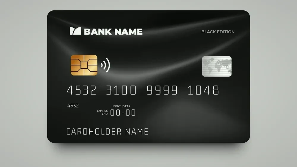 Tarjeta y aplicación bancaria en un móvil, imagen ilustrativa